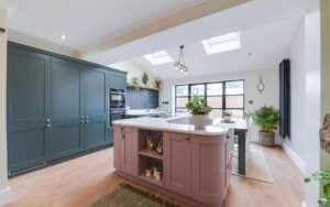 Madison Kitchen in Deep Forest and Vintage Pink by Homestyle Kitchens