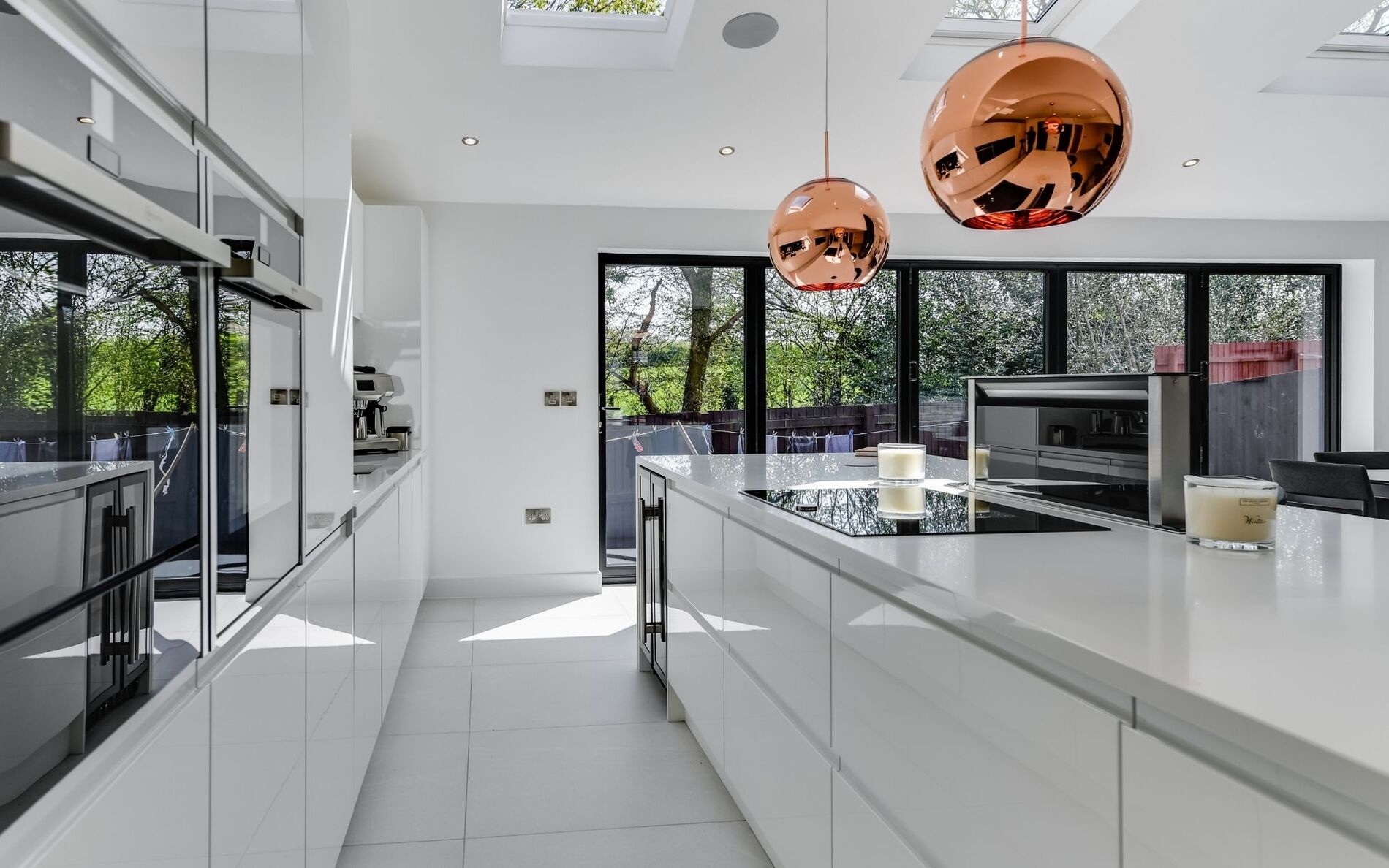 Strada Gloss Kitchen in White by Homestyle Kitchens
