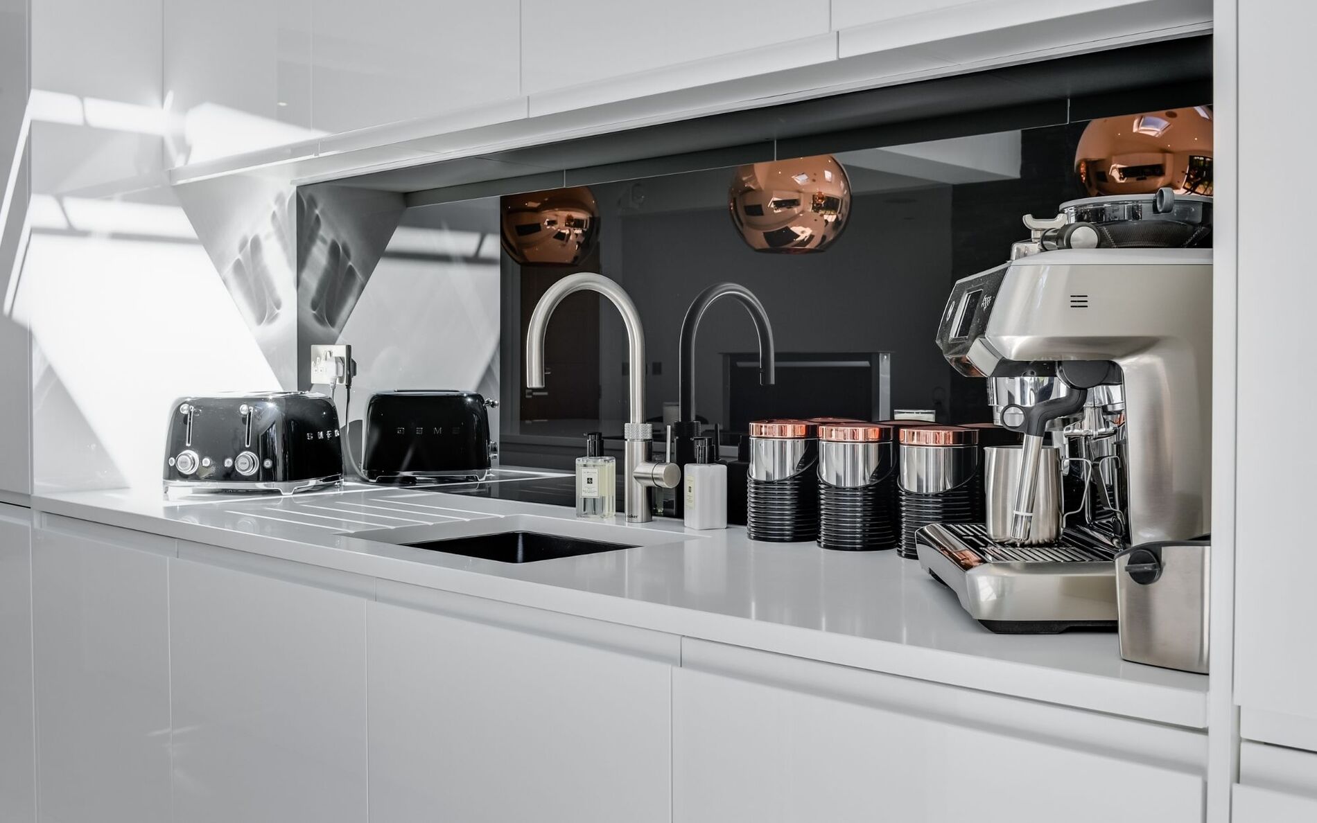 Strada Gloss Kitchen in White by Homestyle Kitchens