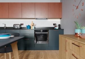 Zola Matte Marine, Ferro Painted Copper & Rezana Stained Light Oak Kitchen by STORI