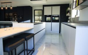 Zola Soft-Matte Kitchen in Indigo and Light Grey by Duo Interiors