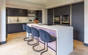 Zola Matte Kitchen in Carbon and Vintage Pink by Kitchen Ergonomics