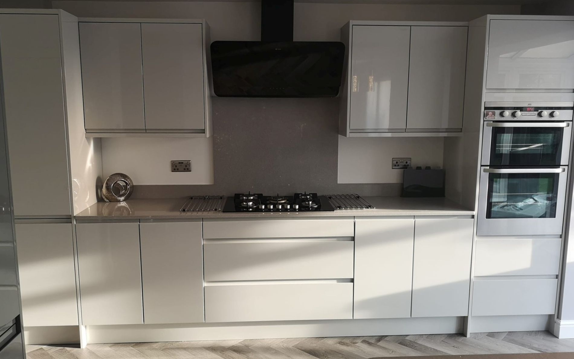 Strada Gloss Kitchen in Light Grey & Graphite by Saturn Interiors