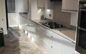 Strada Gloss Kitchen in Light Grey & Graphite by Saturn Interiors