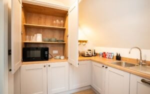 Kensington Utility/Pantry in Cashmere by Stag Kitchens