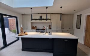Aldana Kitchen in Shell & Cannon Black by Timeless Kitchens