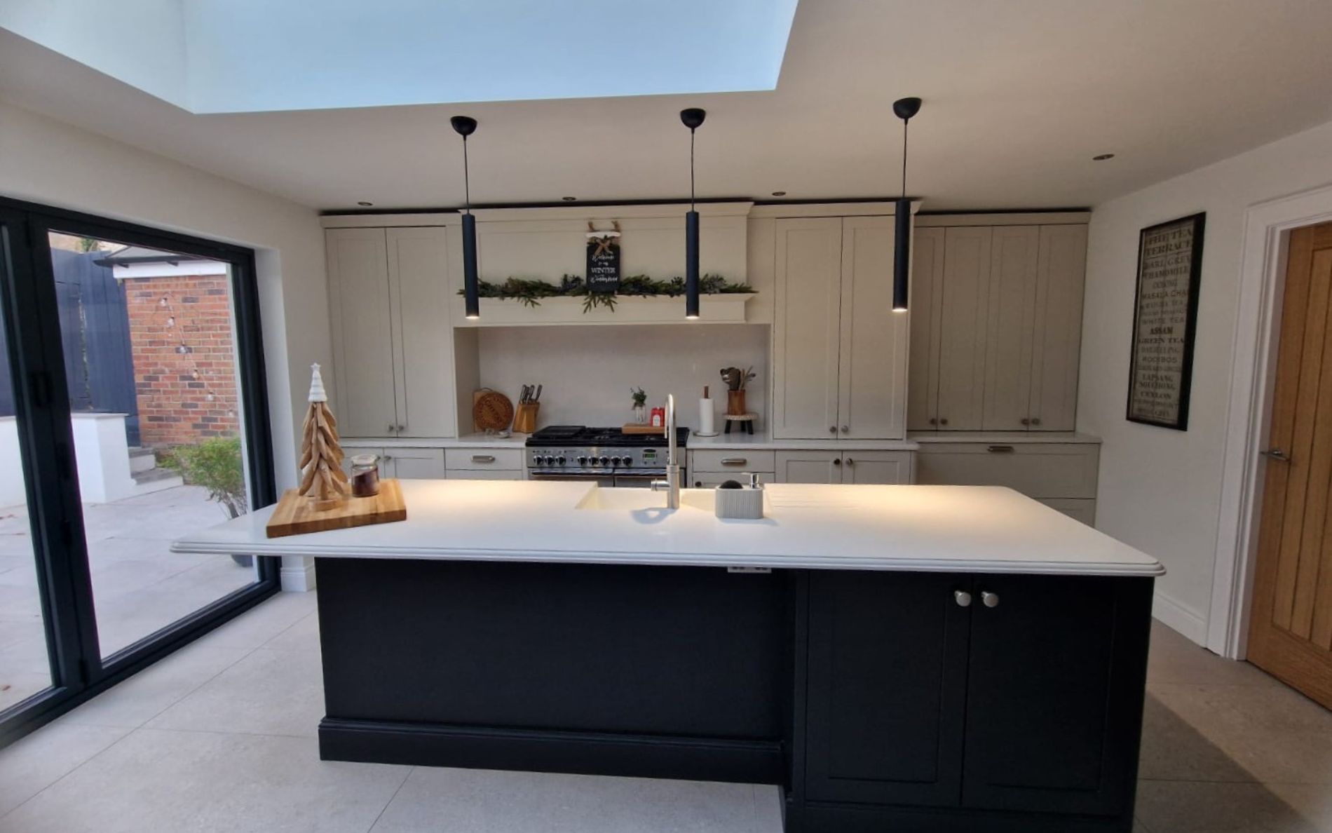 Aldana Kitchen in Shell & Cannon Black by Timeless Kitchens