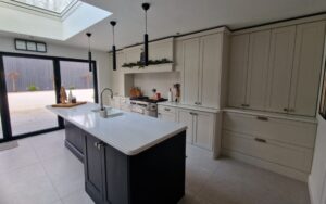 Aldana Kitchen in Shell & Cannon Black by Timeless Kitchens
