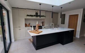 Aldana Kitchen in Shell & Cannon Black by Timeless Kitchens