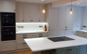 Aldana Kitchen in Taupe Grey & Reed Green by Hanna Bros