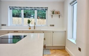 Aldana Kitchen in Taupe Grey & Reed Green by Hanna Bros