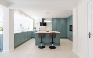 Aldana Kitchen in Light Teal by Kitchen Ergonomics