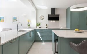 Aldana Kitchen in Light Teal by Kitchen Ergonomics
