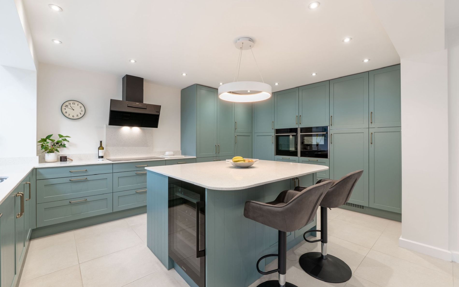 Aldana Kitchen in Light Teal by Kitchen Ergonomics