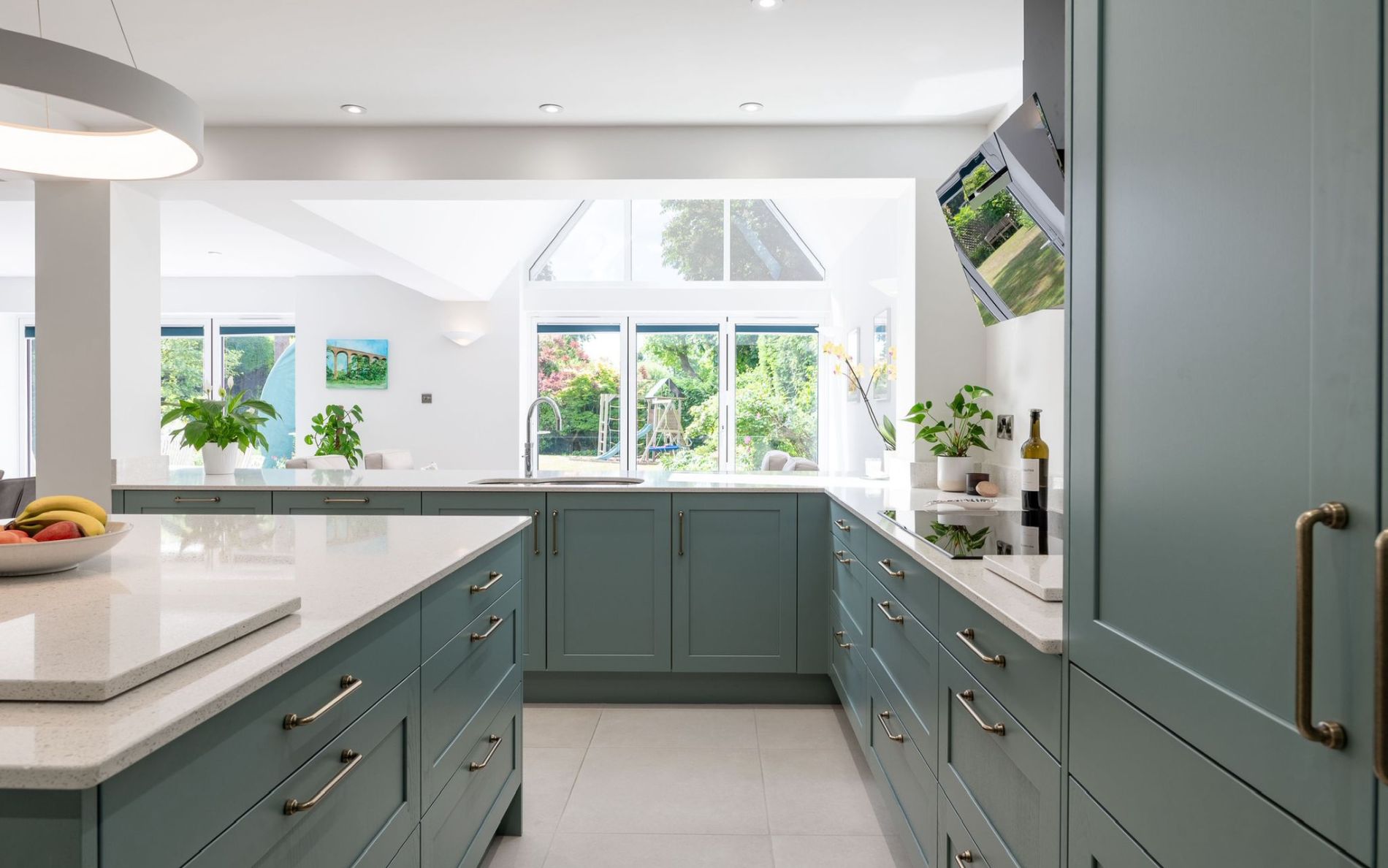Aldana Kitchen in Light Teal by Kitchen Ergonomics