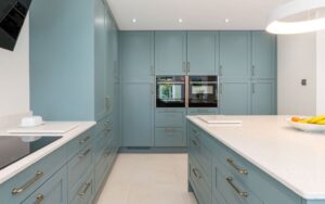 Aldana Kitchen in Light Teal by Kitchen Ergonomics