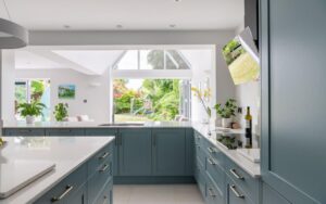 Aldana Kitchen in Light Teal by Kitchen Ergonomics
