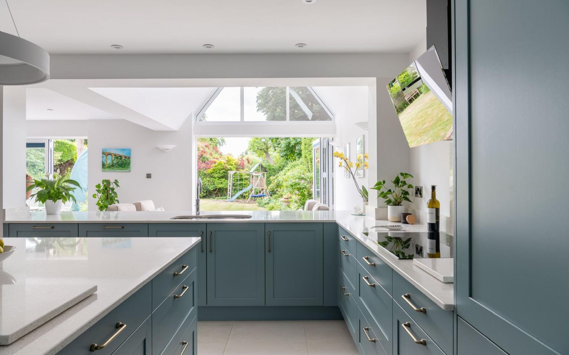 Aldana Kitchen in Light Teal by Kitchen Ergonomics
