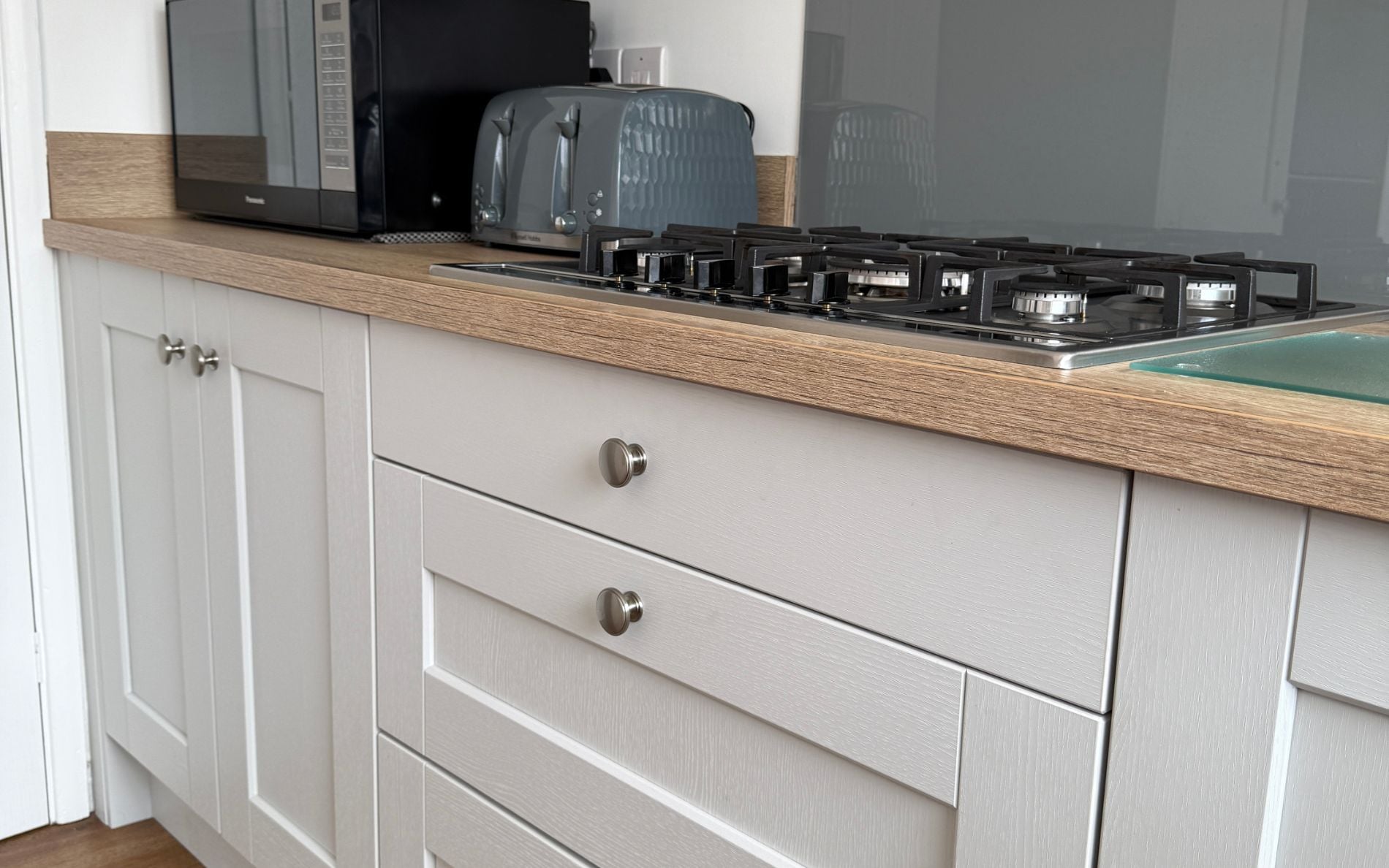 Kensington Kitchen in Light Grey by Saturn Interiors