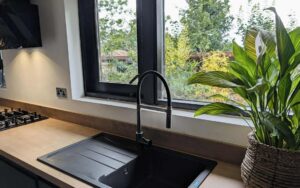 Strada Matte Kitchen in Graphite by Hanna Bros