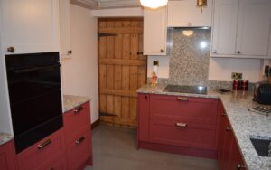 Aldana Kitchen in Antique Red & Cashmere by Walrow Kitchens