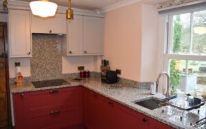 Aldana Kitchen in Antique Red & Cashmere by Walrow Kitchens