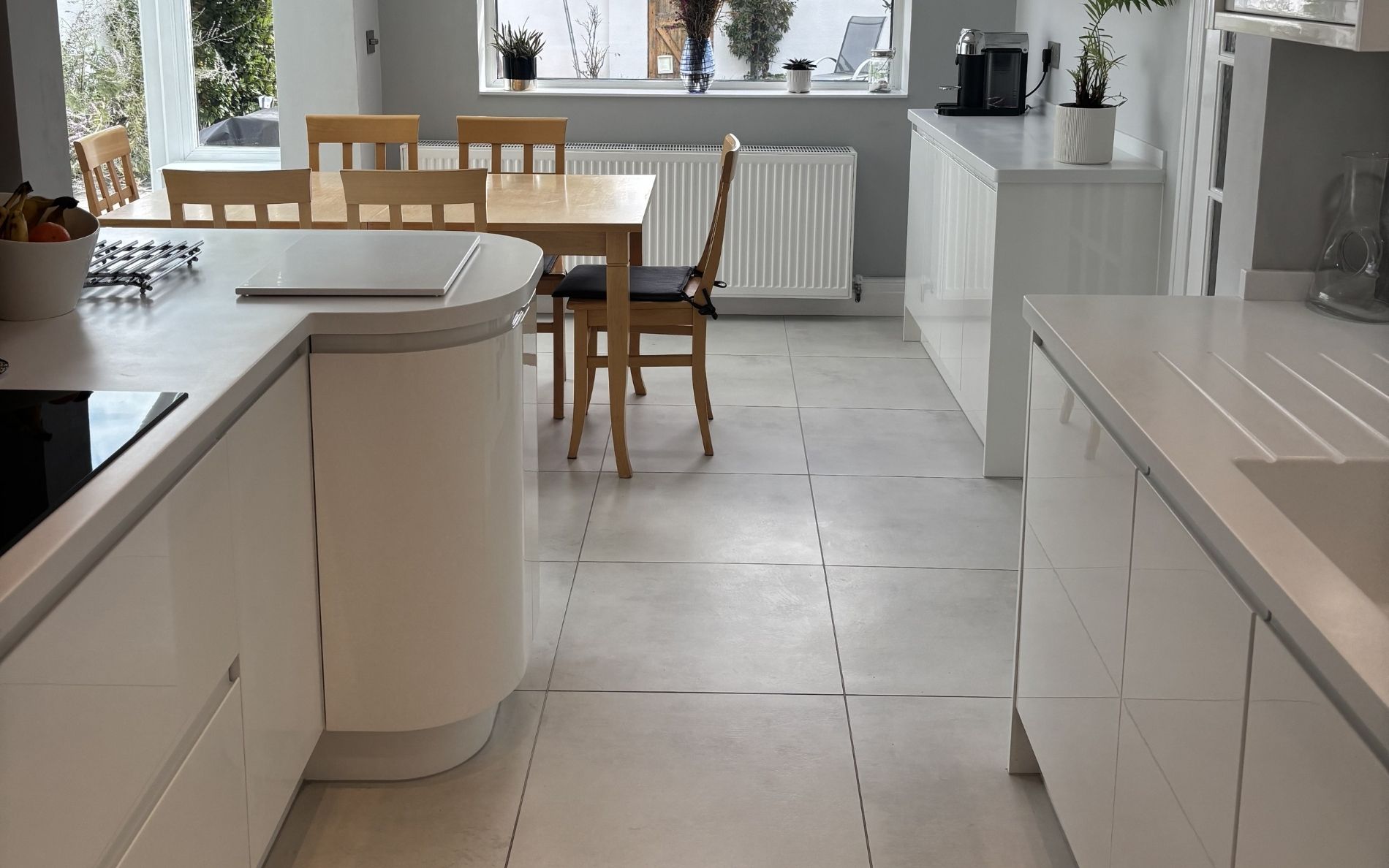 Strada Gloss Kitchen in White by Walrow Kitchens