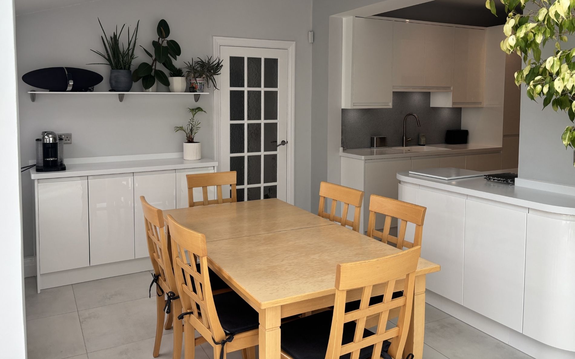 Strada Gloss Kitchen in White by Walrow Kitchens