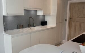 Strada Gloss Kitchen in White by Walrow Kitchens