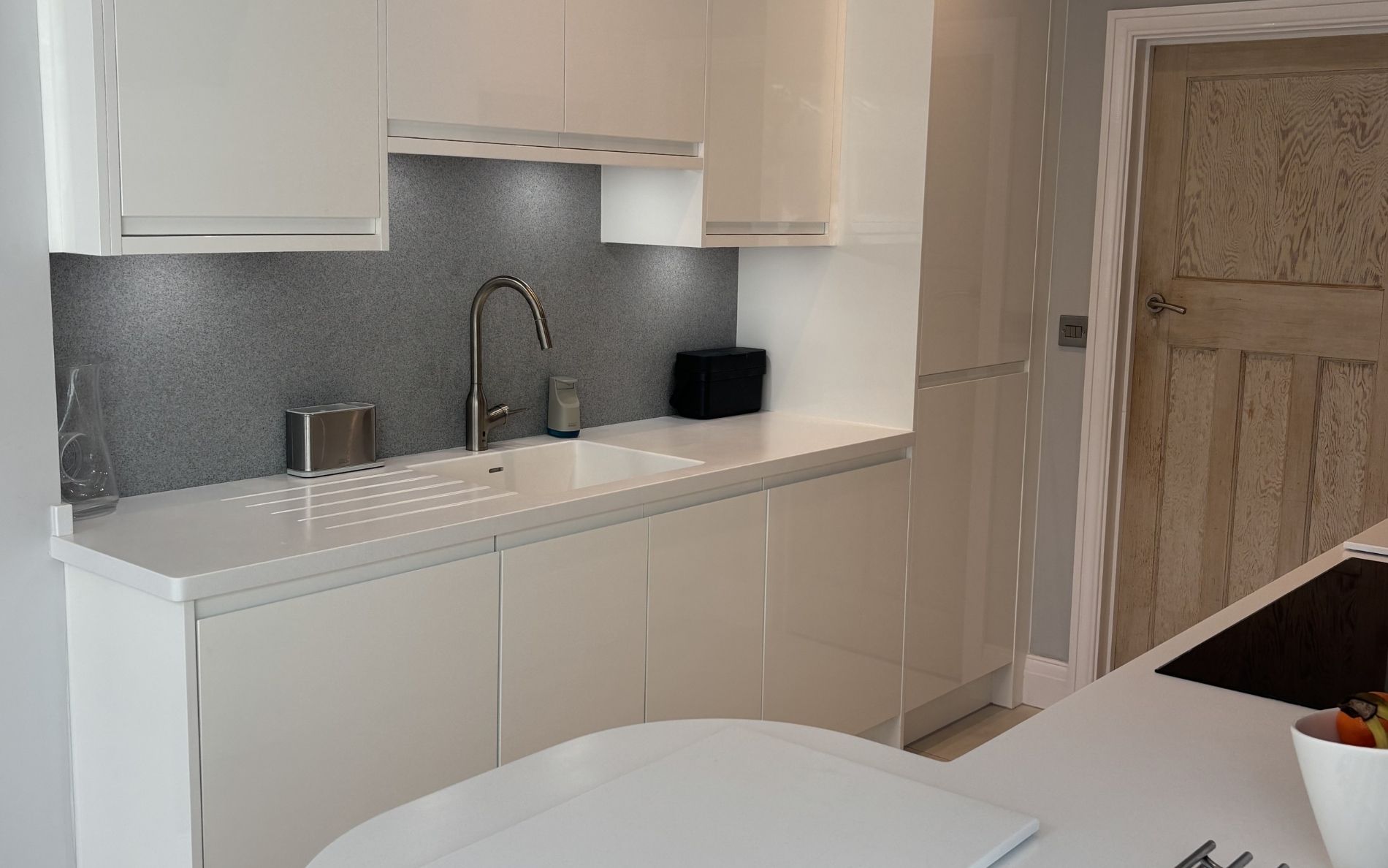Strada Gloss Kitchen in White by Walrow Kitchens