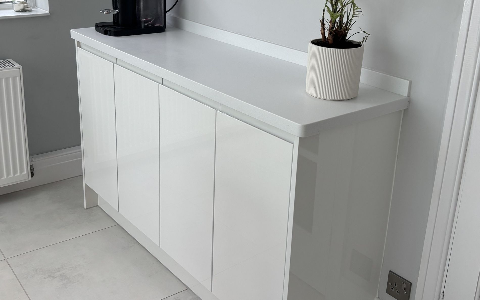 Strada Gloss Kitchen in White by Walrow Kitchens