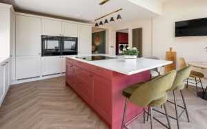 Wakefield Kitchen in Shell & Antique Red by Kitchen Ergonomics