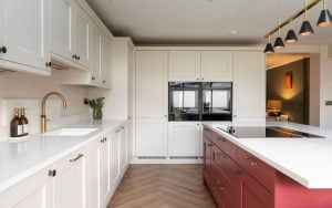 Wakefield Kitchen in Shell & Antique Red by Kitchen Ergonomics