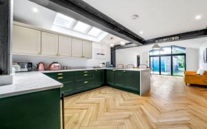 Aldana Kitchen in Deep Forest & Stone by Rever Kitchens