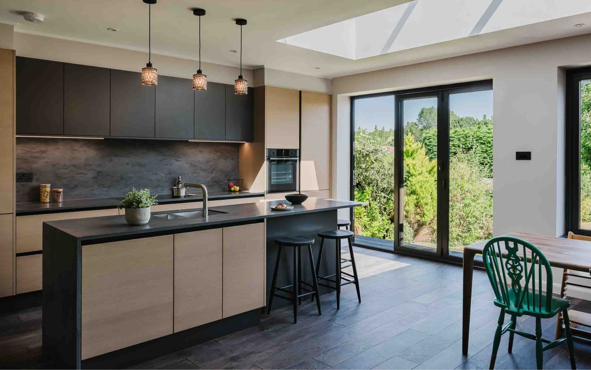 Zola Matte & Tavola Kitchen in Graphite & Parched Oak by Kitchens By Design
