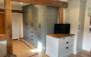 Aldana Bedroom in Reed Green & Mussel by Burnhill Kitchens