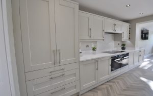 Kensington Kitchen in Mussel & Heritage Green by Family Kitchens